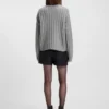 Knitted sweater with bold ribbed structure
