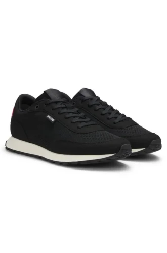Knitted-upper sneakers with logo flag