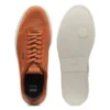 Lace-up trainers with knitted uppers and leather trims
