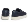 Lace-up trainers with knitted uppers and leather trims