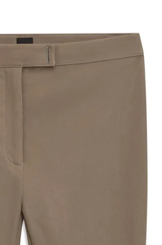 Leather leggings with logo-hook closure