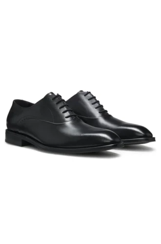 Leather Oxford shoes with perforated details Leather Oxford shoes with perforated details