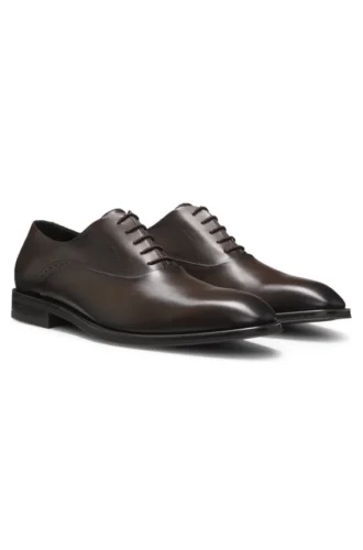 Leather Oxford shoes with perforated details
