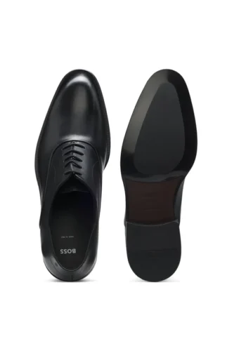 Leather Oxford shoes with perforated details Leather Oxford shoes with perforated details