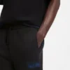 Logo-artwork tracksuit bottoms in cotton terry