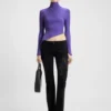 Logo-badge sweater with asymmetric him
