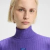 Logo-badge sweater with asymmetric him