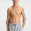 Logo-badge swim shorts with stripe