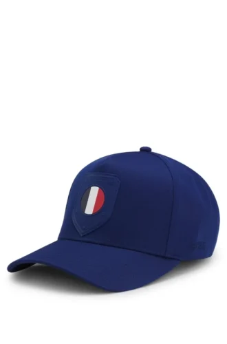 Logo cap in lustrous twill with country-flag badge Logo cap in lustrous twill with country-flag badge
