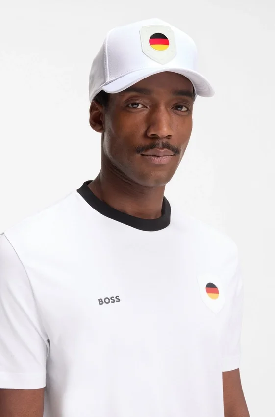 Logo cap in lustrous twill with country-flag badge Logo cap in lustrous twill with country-flag badge
