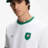 Logo cap in lustrous twill with country-flag badge
