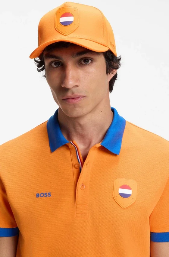 Logo cap in lustrous twill with country-flag badge Logo cap in lustrous twill with country-flag badge