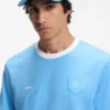 Logo cap in lustrous twill with country-flag badge