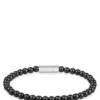 Logo-closure cuff with onyx beads