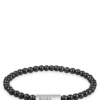 Logo-closure cuff with onyx beads