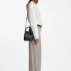 Logo-lettering bucket bag in leather