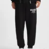 Logo-print tracksuit bottoms in cotton terry