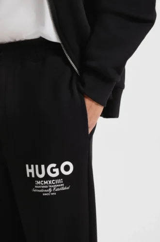 Logo-print tracksuit bottoms in cotton terry