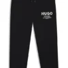 Logo-print tracksuit bottoms in cotton terry