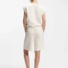 Loose-fit sweatshirt with V-cut hemline