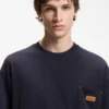Loose-fit T-shirt in cotton with suede logo badge