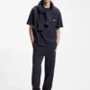 Loose-fit T-shirt in cotton with suede logo badge