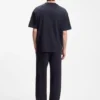 Loose-fit T-shirt in cotton with suede logo badge