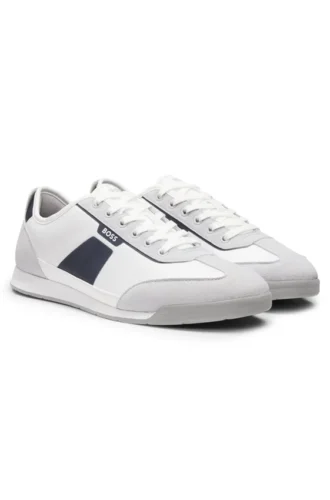 Low-top trainers with structured trims
