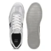 Low-top trainers with structured trims
