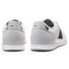 Low-top trainers with structured trims