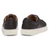 Low-top trainers with woven and grained effects