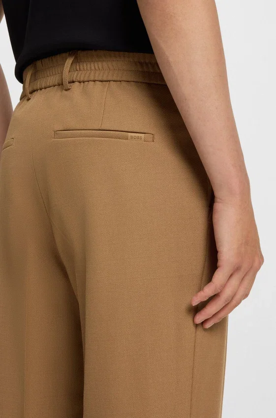 Machine-washable tapered-fit trousers in stretch fabric Machine-washable tapered-fit trousers in stretch fabric
