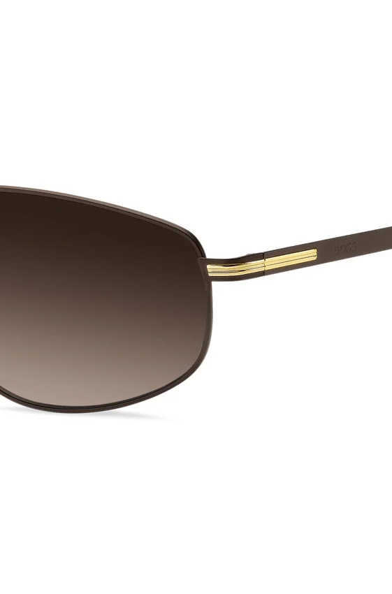 Matte brown sunglasses with gold-tone trims Matte brown sunglasses with gold-tone trims