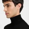 Merino wool turtleneck sweater with embroidered logo