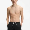 Mesh swim shorts with jacquard logo tape