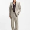 Micro-patterned trousers in an oversized-fit Micro-patterned trousers in an oversized-fit