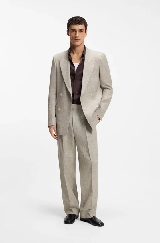 Micro-patterned trousers in an oversized-fit Micro-patterned trousers in an oversized-fit