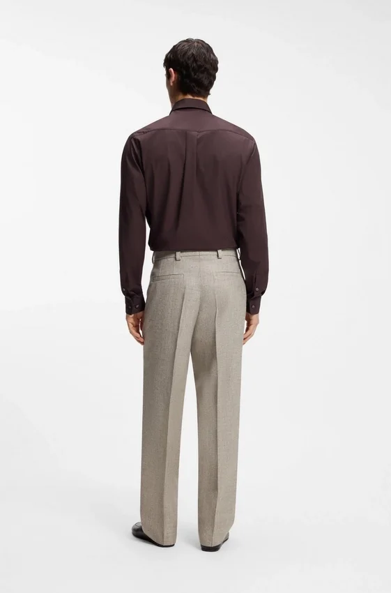 Micro-patterned trousers in an oversized-fit Micro-patterned trousers in an oversized-fit