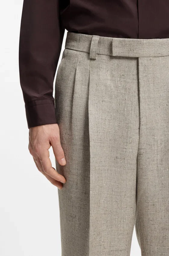 Micro-patterned trousers in an oversized-fit Micro-patterned trousers in an oversized-fit