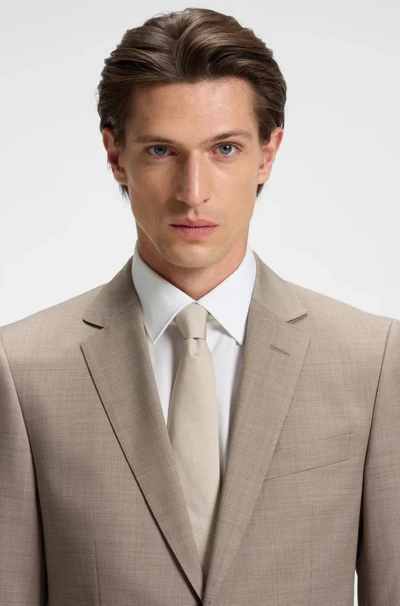 Micro-patterned two-piece slim-fit suit in virgin wool Micro-patterned two-piece slim-fit suit in virgin wool