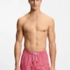 Micro-print swim trunks with logo patch