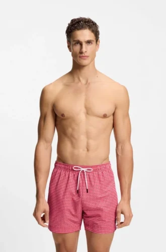 Micro-print swim trunks with logo patch