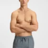 Micro-print swim trunks with logo patch
