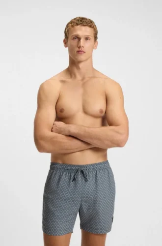 Micro-print swim trunks with logo patch