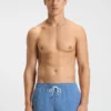 Micro-print swim trunks with logo patch
