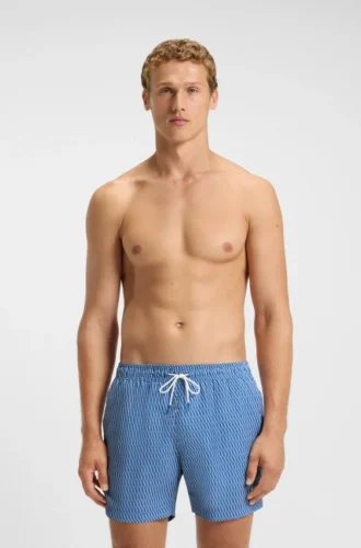 Micro-print swim trunks with logo patch