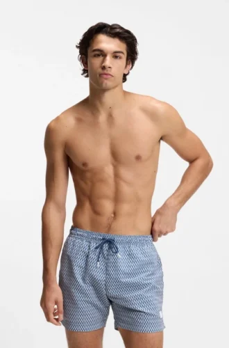 Micro-print swim trunks with logo patch