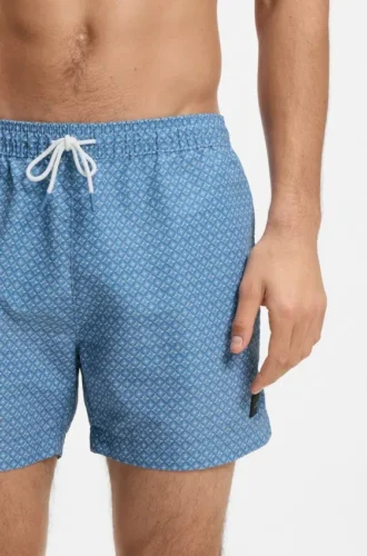 Micro-print swim trunks with logo patch