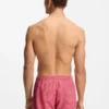 Micro-print swim trunks with logo patch