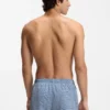 Micro-print swim trunks with logo patch